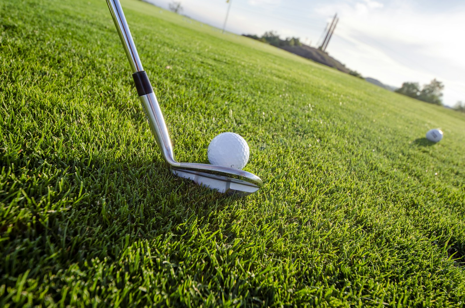 Close view of a golf ball on a tee
